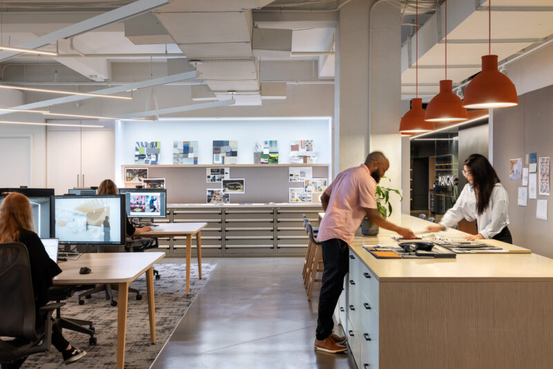 Interior design of a corporate office with an open workspace in New York City.
