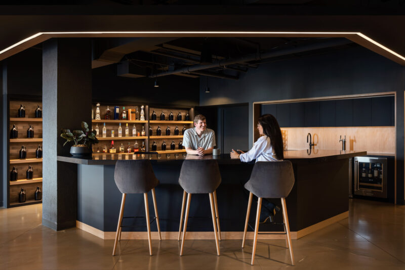 Interior design of a corporate office highlighting a bar and lounge in New York City.