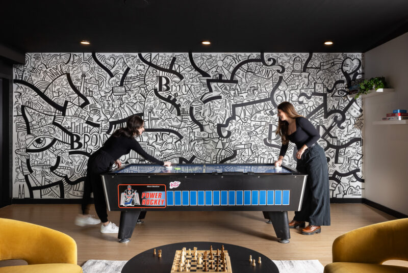 Architecture highlighting the game room at the The Motto High-Rise, Bronx NY