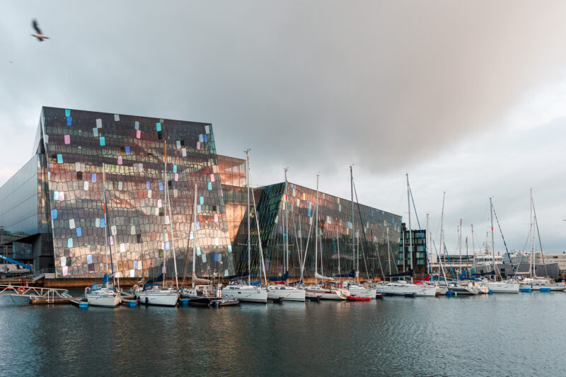 Exterior architecture of the Harpa Concert Hall, in Reykjavík,Iceland during sunset. Photographed by Van Tassell Studio.