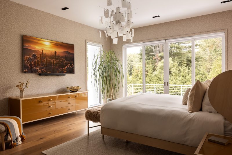 Bedroom design with textured wall covering in a custom home located in Ocean New Jersey.