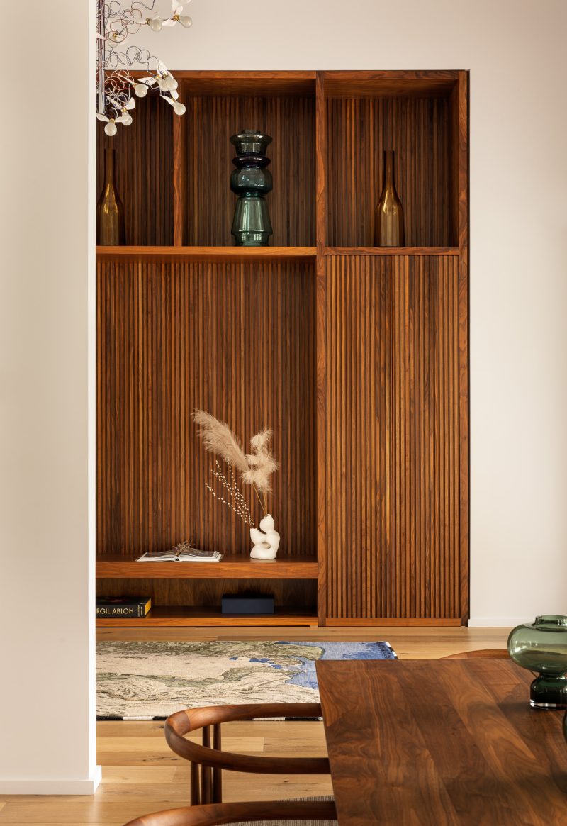 Dining room design with large built-in shelving in a custom home located in Ocean New Jersey.