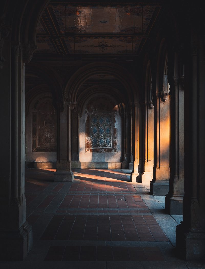Bethesda Terrace in Central Park, NYC illuminated by light.
